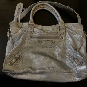 Balenciaga silver shoulder bag.